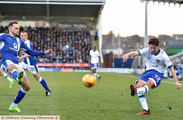 FULL-BACK Rob Hunt whips in a cross from the left-hand side