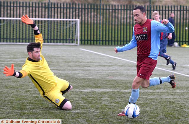 GOING FOR GOAL . . . Hulmeians' Jamie McCarthy is in full flight