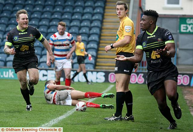 Oldham Rougheds V Rochdale Hornets, match played at the Spotland ground, Rochdale. Oldham player,(green strip),Tyoyo Egodo, celebrates scoring a try for Oldham.