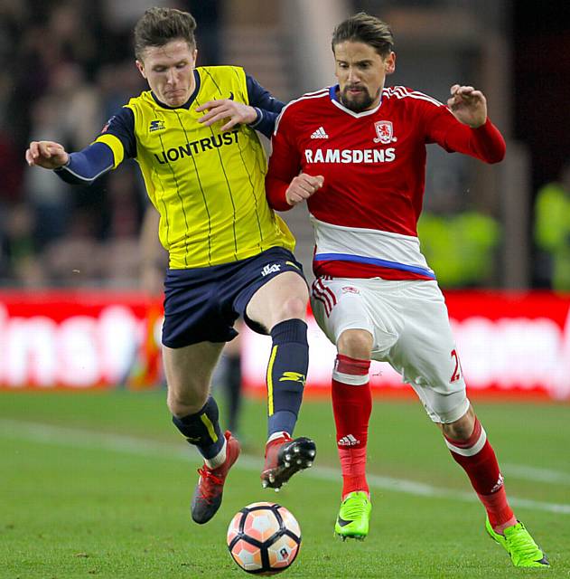 IN GOOD NICK: Oxford's John Lundstram (left)