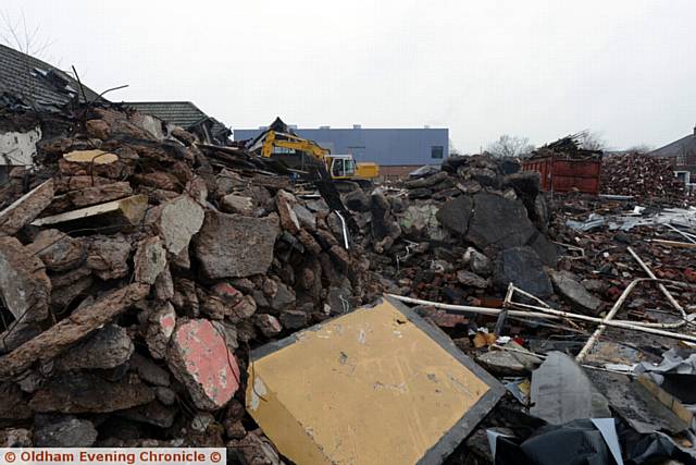 WORK . . . Byron Street School demolition in progress