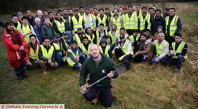 TEAMWORK . . . Kevin Wigley from City of Trees with the volunteers