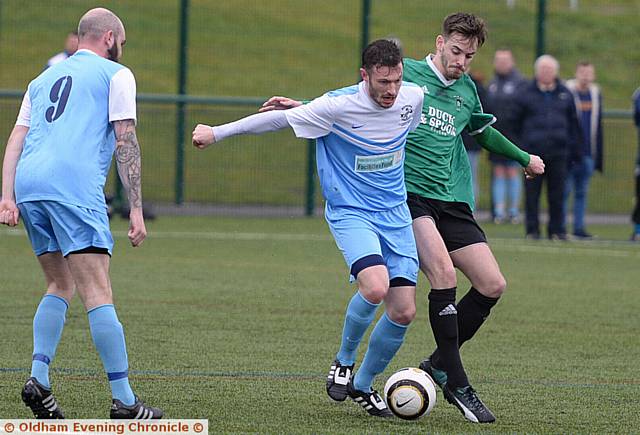 ON TARGET: Heyside's Daniel Dunn (centre)