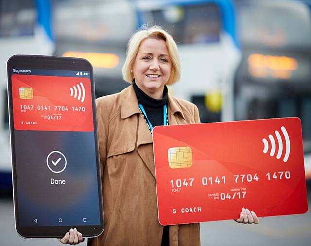 NEW SYSTEM . . . Stagecoach MD Elisabeth Tasker at the launch of a contactless payment system for its Manchester fleet NEW SYSTEM . . . Stagecoach MD Elisabeth Tasker at the launch of a contactless payment system for its Manchester fleet