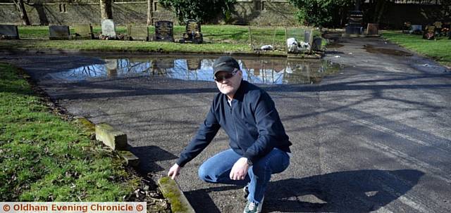 DISGRACE . . . John Ryan, from Royton, at Chadderton Cemetery
