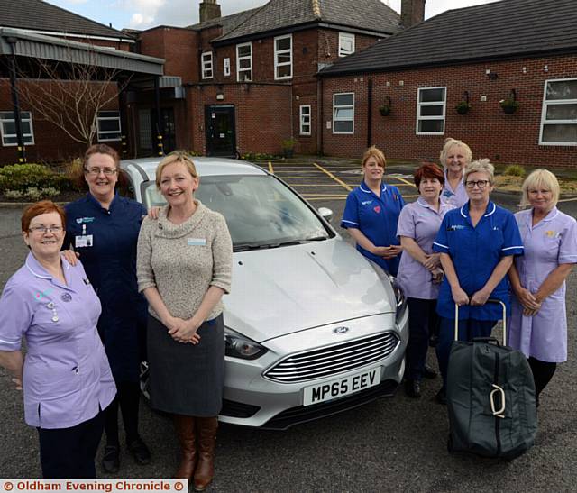 FUNDING delight . . . nurses and health care assistants, from left, Carole England, Adele Doherty (practice development), Joanne Sloan (director clinical services), Susan Mear, Assumpta Rabbitt, Brenda Harston, Linda Algar and Linda Waine