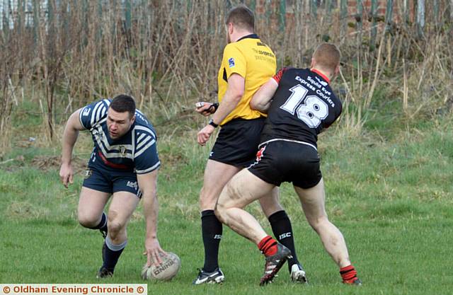 TOUCH DOWN . . . Pete Jackson puts Hollinwood on the board