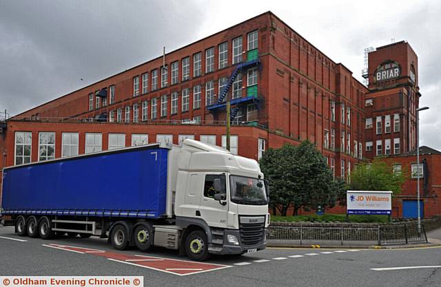 JD Williams in Shaw. Planning application to extend hours of the Lilac Mill distribution centre. PIC shows Briar Mill and delivery vehicles.