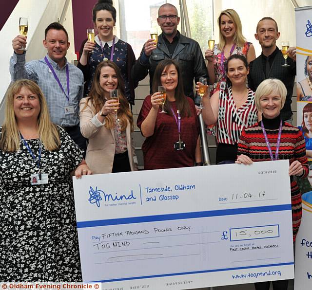 DONATION . . . At the cheque presentation are (front, from left) Jenny Robinson of MIND and Cath Green, FCHO chief executive