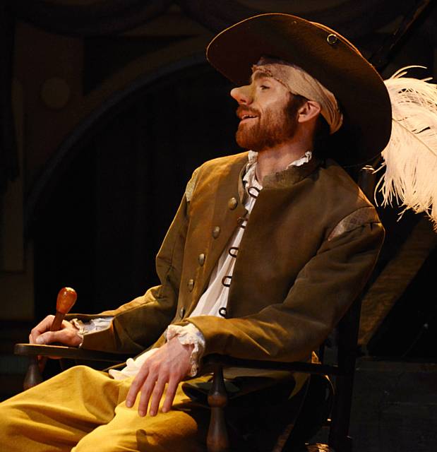 Cyrano (Christian Edwards) prepares to exercise his sword-fighting skills.