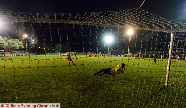 IT'S OVER . . . goalkeeper Stephen Longrigg saves Jason Hill's penalty to send City of Liverpool through