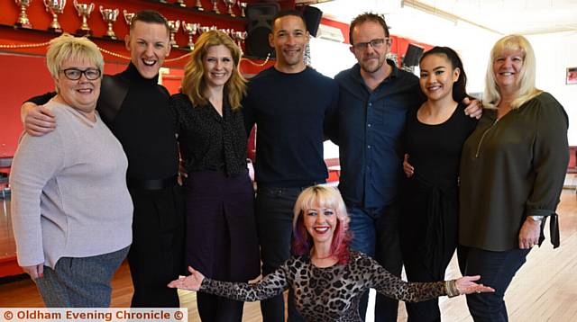 TEAM effort . . .  From left, event organiser June Burns, dance teacher Jack Clegg, Samantha Giles (who plays Bernice), ex-footballer Jason Jarrett, Liam Fox (who plays Dan Spencer), Royton dancer Vanessa Wong and event organiser Julie Garrity with Trudy Mainwaring, front, Trujons owner
