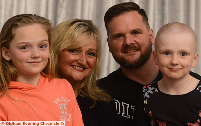 WARRIOR . . . Pippa Tierney (right) with her parents Nicola and Mark, and sister Ava