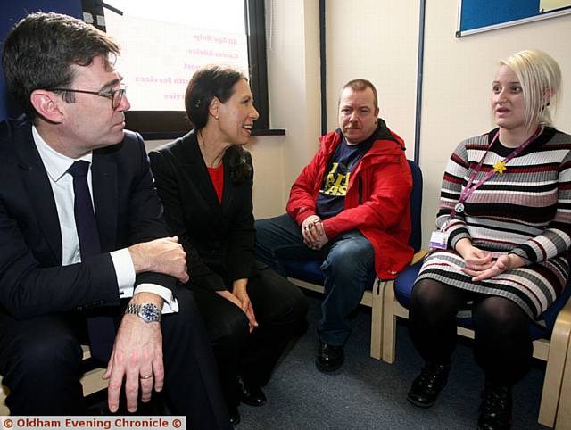 ANDY Burnham MP and Debbie Abrahams MP talking to John Whitehouse and Chloe Sypula