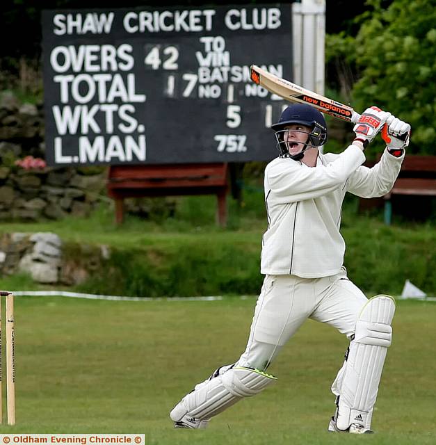 SHAW'S Richard Keaveney carves the ball over the boundary against Middleton