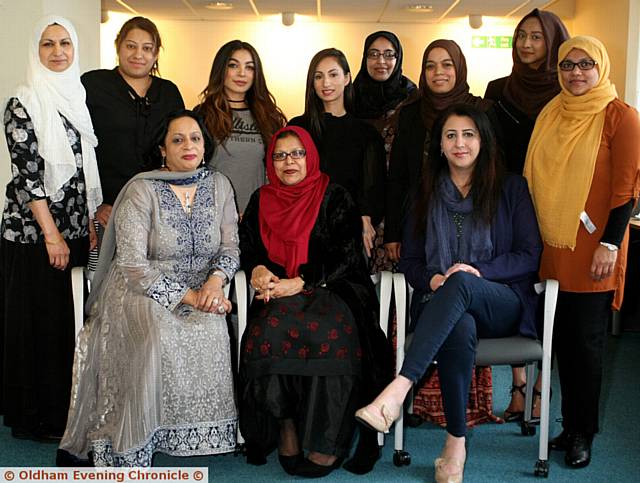 BARONESS Uddin, (seated middle front row), along with invited guests