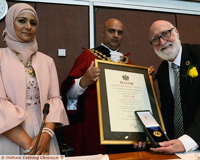 PRESENTATION . . . New Mayor and Mayoress Councillor Shadab Qumer and his wife Sobia Arshi, with retiring mayor Councillor Derek Heffernan. Right: Retiring mayoress Di Heffernan
