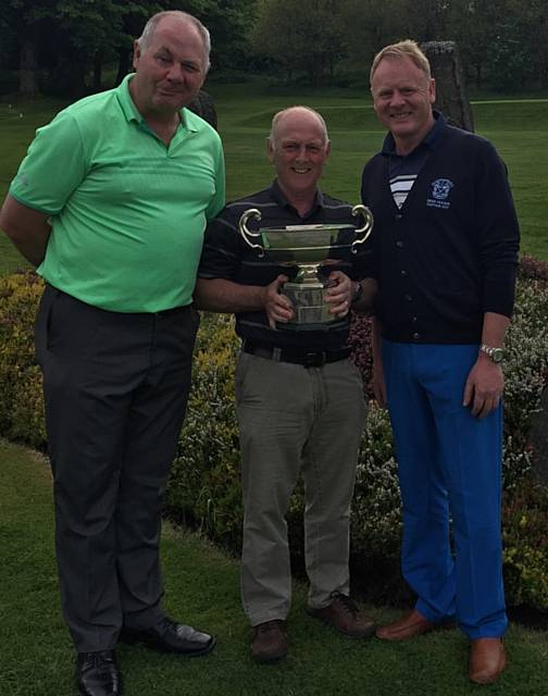 COMMITTEE Cup winner Roy Dobson (centre) flanked by president Dave Pullen (left) and captain Dean Jagger