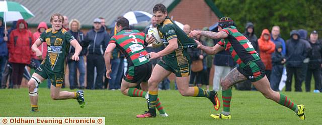 SUPER SAINT . . . Dominic Bryan on the charge for Oldham St Anne's against Waterhead