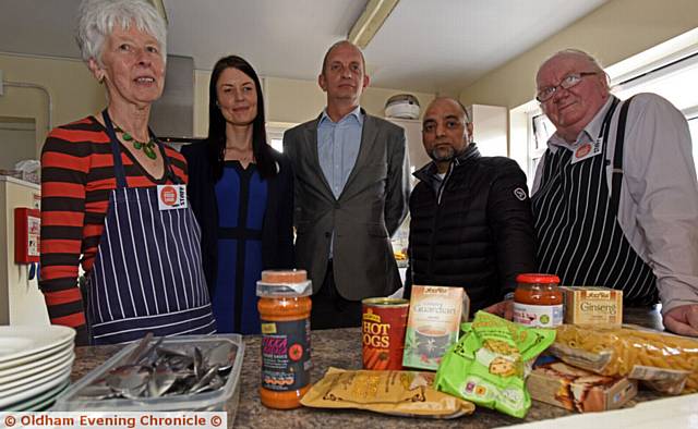 FOOD for the needy . . . Margaret Halley (volunteer), Marie Toora (Tesco), Ash Cooper (FareShare), Nasim Ashraf (UKEFF) and Andrew Clark (volunteer)