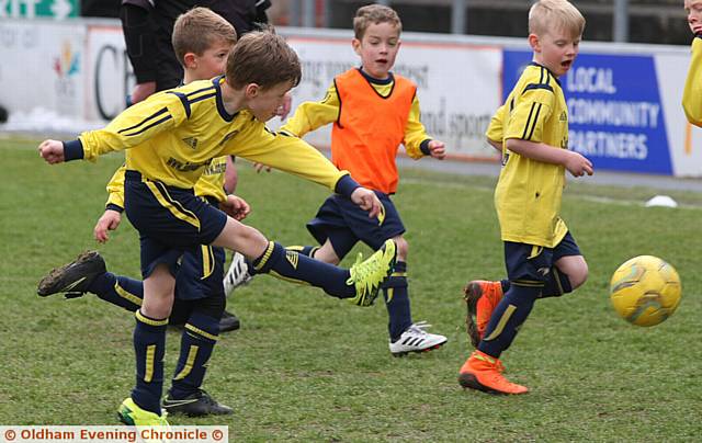 WHAT A GOAL . . . Austin Ellis, playing for the Dynamos' under-sevens, scores