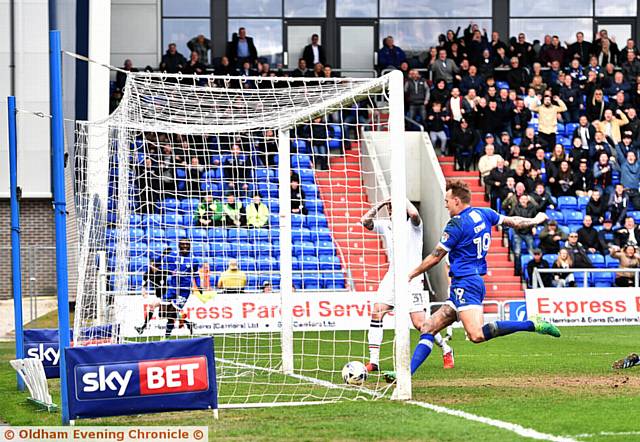 CAN'T MISS . . . Lee Erwin smashes home Athletic's winner against Bolton