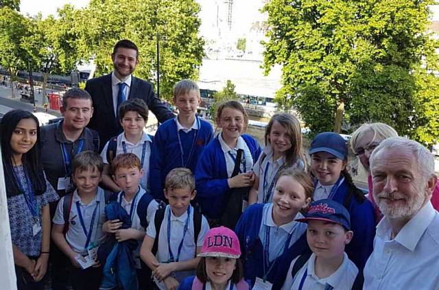 MP Jim McMahon (back left) with Labour leader Jeremy Corbyn (front right) and pupils from Whitegate End Primary School