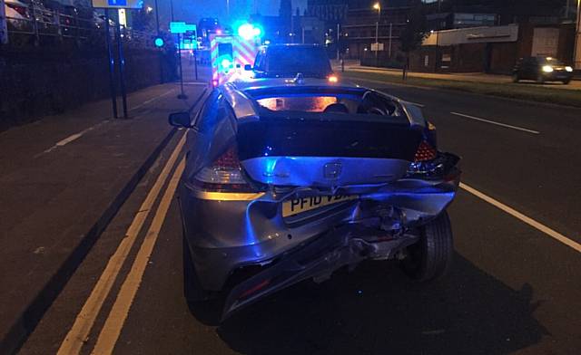 CRUNCH . . . the damaged vehicle after being hit on Huddersfield Road