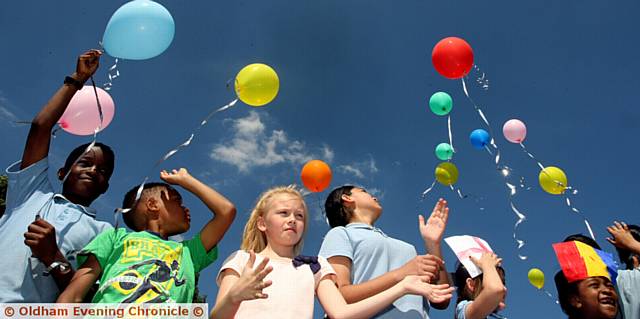 Alt primary school in Oldham held a Diversity parade at the school. Pic shows, pupils at the school releasing ballons in memory to the dead from the Manchester attack.
