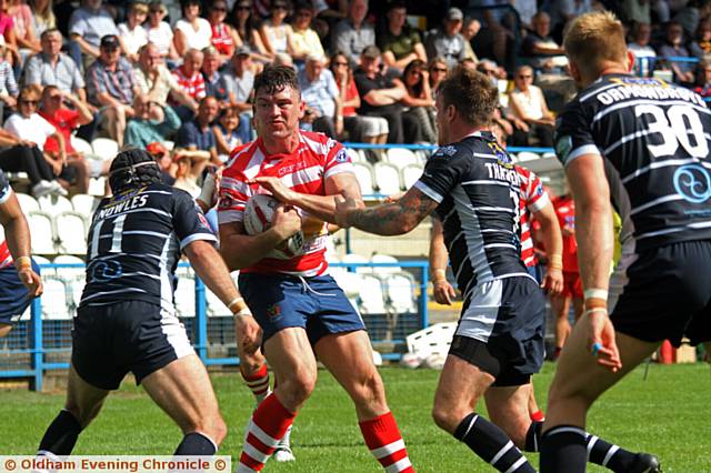 TOUGH TASK: Luke Adamson takes up the ball