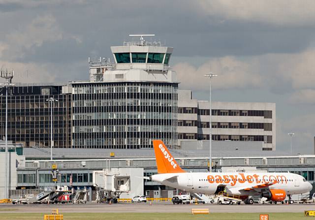 RECORD passenger 

numbers . . . at 

Manchester Airport