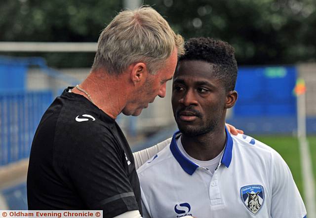 NOW HEAR THIS . . . manager John Sheridan talks to Enoch Andoh before last night's match. PICTURES by ANTHONY MILLER