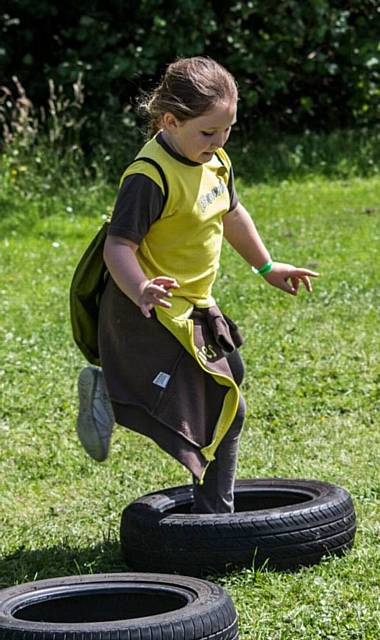 STEPPING in . . . Mia Heaton (7) tackling the tyre section