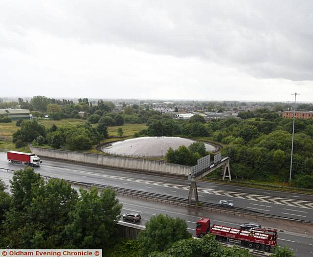 MARKING the start of regeneration plans . . . the gas holder in Hollinwood is to be demolished to make way for a new development