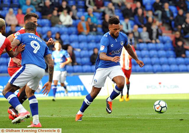 ON THE RUN: Athletic striker Aaron Amadi-Holloway prepares to shoot against Girona