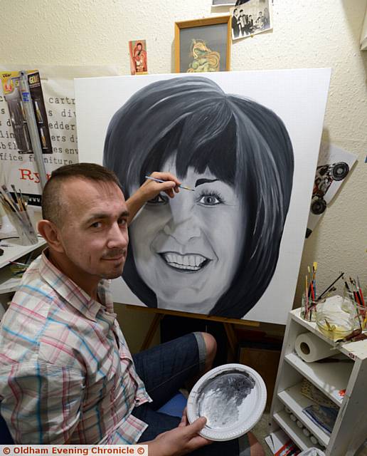 Polish artist Leszek Terlecki (45) pictured in his studio, under the stairs in his flat