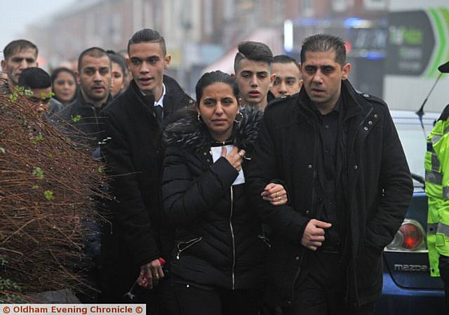 ZANETA'S parents arriving at church for her funeral