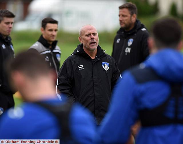 NOW HEAR THIS . . . Tommy Wright addresses the Athletic players during training.