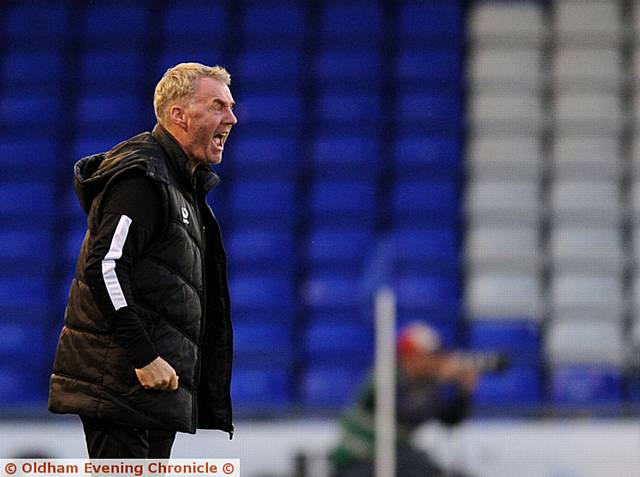 'GUTTED' . . . Athletic boss John Sheridan yells his instructions from the touchline during last night's Carabao Cup defeat by Burton.
