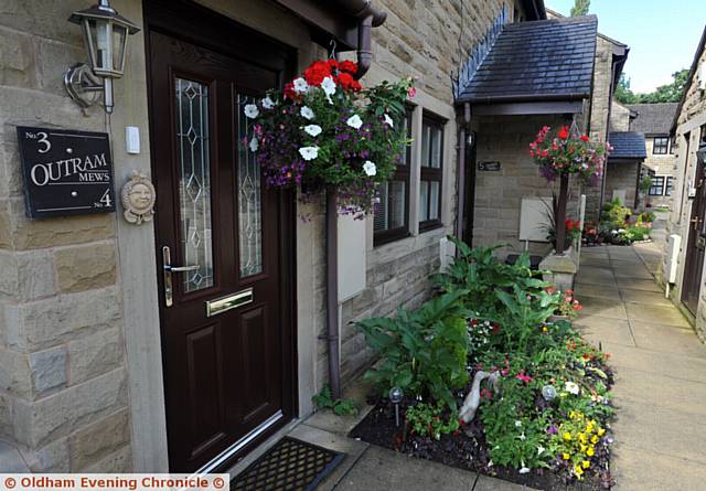 WINNER . . . Outram Mews, Uppermill, won the Community Garden category