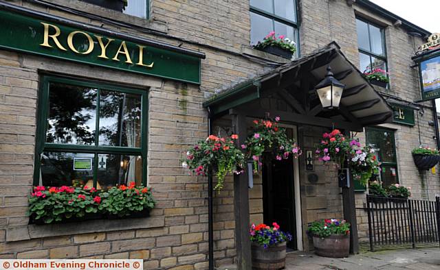 JOINT winner . . . The Royal George, Greenfield  was joint winner of Best Blooming Pub category