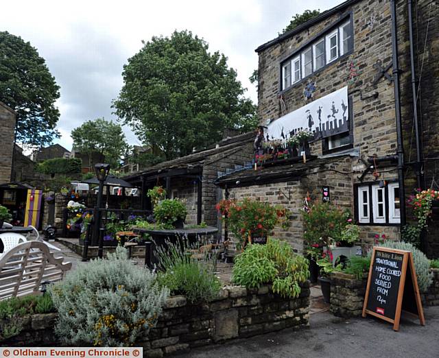 Saddleworth In Bloom joint winner of Best Blooming Pub, the White Lion in Delph.