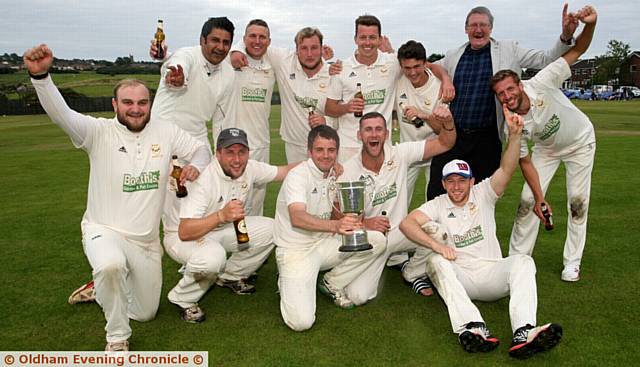 HEYSIDE ON A HIGH . . . players celebrate Tanner Cup final glory.