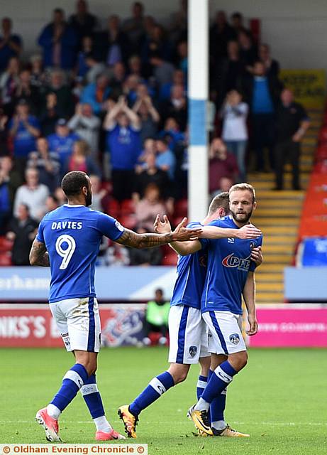 PUT IT THERE . . . Craig Davies congratulates Ryan McLaughlin as Athletic take a first-half lead
