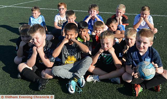 FEELING glum . . . some of the young Hollinwood FC players unhappy with the decision. In front are, from left, Mason Walsh-Roberts, Dayyan Ali, Lewis Carter-Bullock, Marc Jones
