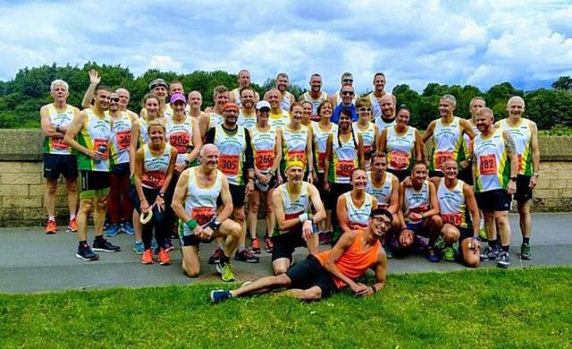 ALL READY FOR THE OFF . . . Royton Road Runners line up before the start in Lancaster ALL READY FOR THE OFF . . . Royton Road Runners line up before the start in Lancaster