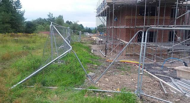 A POLICE photograph of the damaged fencing at the site