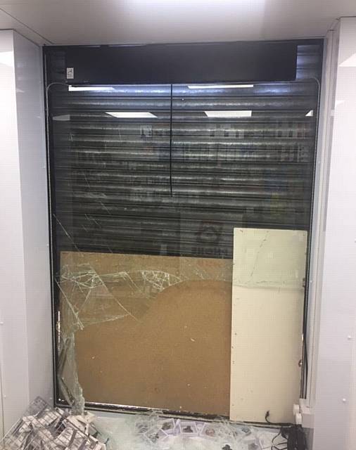 CCTV  footage of a break in at The Phone Hub, Peel Street, Chadderton, Tuesday, August 15, 4am - damaged roller doors
