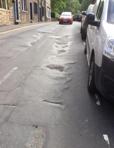 REPAIRS . . . A team will start work on the bumpy road surface in New Street