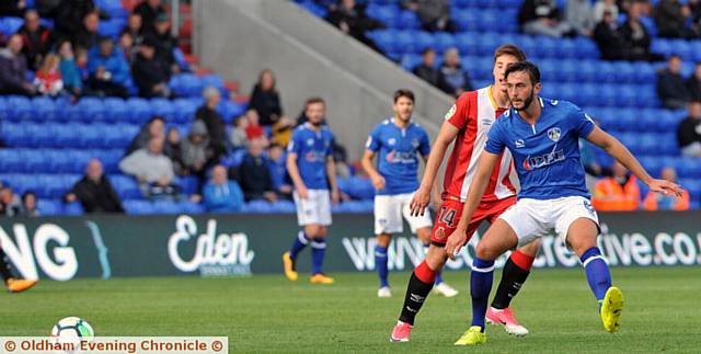 OPTIMISTIC . . . Midfielder Ollie Banks in action against Girona
